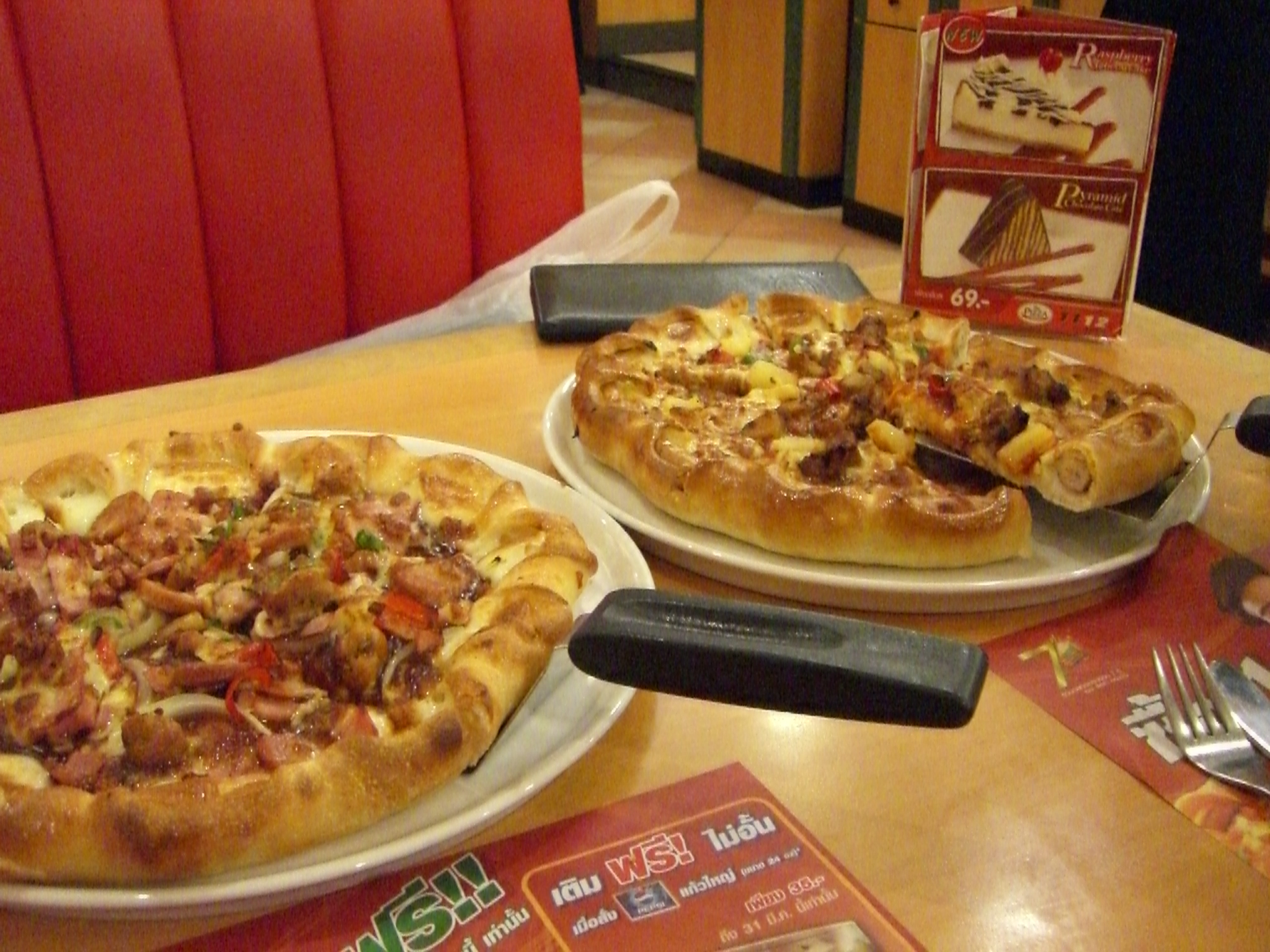 Thai Hot Dog Stuffed Pizza and Singaporean Prosperity Pizza